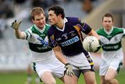 7 November 2010; Ross O'Carroll, Kilmacud Crokes, in action against Barry Fitzgerald, Portlaoise. AIB GAA Football Leinster Club Senior Championship Quarter-Final, Portlaoise v Kilmacud Crokes, O'Moore Park, Portlaoise, Co. Laois. Picture credit: Brian Lawless / SPORTSFILE