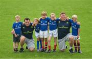 17 August 2016; Leinster Rugby players Cian Healy and Tadhg Furlong with young participants, from left to right, Cian Foley, age 6, from Artane, Dublin, Caoimhe Heenahan, age 6, from Clontarf, Dublin, Mathew Bryans, age 8, from Contarf, Dublin, Cathrine Coll, age 8, from Drumcondra, Dublin and   Rubin Bulger, age 6, from Clontarf, Dublin at the Bank of Ireland Leinster Rugby Camp at Clontarf FC, Castle Avenue, Clontarf, Dublin. Photo by Eóin Noonan/Sportsfile