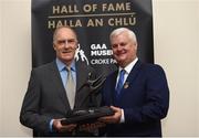 18 August 2016; Uachtarán Chumann Lúthchleas Gael Aogán Ó Fearghail presents the Hall of Fame award to  Kerry footballer John O'Keeffe during the announcement of the 2016 Inductees into the GAA Museum Hall of Fame at the GAA Museum Auditorium in Croke Park, Dublin. Photo by Matt Browne/Sportsfile