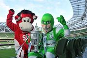 12 November 2010; Sligo Rovers mascot Benny the Bull and Shamrock Rovers mascot Hooperman with the FAI Ford Cup ahead of Sunday's FAI Ford Cup Final between Shamrock Rovers and Sligo Rovers. Aviva Stadium, Lansdowne Road, Dublin. Picture credit: David Maher / SPORTSFILE