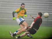 14 November 2010; Dara Gallagher, Naomh Conaill, scores his side's only goal against Johnathan Curran, Coalisland Fianna. AIB GAA Football Ulster Club Senior Championship Semi-Final, Coalisland Fianna v Naomh Conaill, Brewster Park, Enniskillen, Co. Fermanagh. Picture credit: Oliver McVeigh / SPORTSFILE