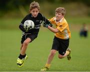 21 August 2016; Action from the Boys U10 Gaelic Football match between Listowel, Co. Kerry, and Clontibret, Co. Monaghan, at Weekend 2 of the Community Games National Festival at Athlone I.T in Athlone, Co Westmeath. Photo by Seb Daly/Sportsfile