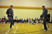 15 November 2010; Republic of Ireland Internationals, Glenn Whelan and Keith Fahey, show off their skills to local children at the launch of the Late Night League initiative between the FAI, Dublin City Council, Fingal County Council, South Dublin County Council, Dun Laoghaire Rathdown County Council and An Garda Siochana. Late Night League Partnership Launch, Darndale Belcamp Village Centre, Darndale, Dublin. Picture credit: David Maher / SPORTSFILE