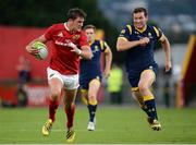 26 August 2016; Dan Goggin of Munster sprints away from Wynand Oliver of Worcester Warriors during the Pre-Season Friendly game between Munster and Worcester Warriors at Irish Independent Park in Cork. Photo by Seb Daly/Sportsfile