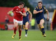 26 August 2016; Dan Goggin of Munster sprints away from Wynand Oliver of Worcester Warriors during the Pre-Season Friendly game between Munster and Worcester Warriors at Irish Independent Park in Cork. Photo by Seb Daly/Sportsfile