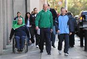 18 November 2010; Some of Ireland’s leading sportsmen and sportswomen, led by Garrett Culliton, Paralympic Sport, Paul O'Connell, Rugby, and Robert Deegan, Special Olympics, on their way to presenting a submission to Mary Hanafin TD, Minister for Tourism, Culture and Sport, earlier today, Thursday 18th November, on behalf of all national sporting organisations. The submission highlights how major cuts will set Irish sport back for decades to come and outlines the vital role played by Government funding in the continuing development of Irish sport. Department of Tourism Culture and Sport, Kildare Street, Dublin. Picture credit: Brendan Moran / SPORTSFILE