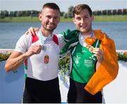 27 August 2016; Paul O'Donovan of Ireland with Lukas Babac of Slovakia, left, after winning gold in the Lightweight Men’s Single Sculls Final at the 2016 World Rowing Championships at the Willem-Alexanderbaan Rowing Venue in Rotterdam, Netherlands. Photo by ANP Orange Pictures / Herman Dingler / Sportsfile