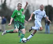 20 November 2010; Paddy Madden, Republic of Ireland U21 XI, shoots to score his side's first goal despite the attentions of Ian Cherry, Republic of Ireland Amateurs. Friendly, Republic of Ireland U21 XI v Republic of Ireland Amateurs, AUL Complex, Clonshaugh, Dublin. Picture credit: Barry Cregg / SPORTSFILE