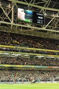 20 November 2010; A large crowd sings the National Anthem as Ireland captain Brian O'Driscoll appears on the big screen. Autumn International, Ireland v New Zealand, Aviva Stadium, Lansdowne Road, Dublin. Picture credit: Brendan Moran / SPORTSFILE