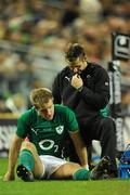 20 November 2010; Luke Fitzgerald, Ireland, is attended to by team physio Cameron Steele after picking up an injury in the second half. Autumn International, Ireland v New Zealand, Aviva Stadium, Lansdowne Road, Dublin. Picture credit: Stephen McCarthy / SPORTSFILE
