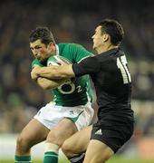 20 November 2010; Rob Kearney, Ireland, is tackled by Dan Carter, New Zealand. Autumn International, Ireland v New Zealand, Aviva Stadium, Lansdowne Road, Dublin. Picture credit: Brendan Moran / SPORTSFILE