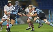 21 November 2010; BJ Botha, Ulster, is tackled by Paul Tito, Cardiff Blues. Celtic League, Cardiff Blues v Ulster, Cardiff City Stadium, Cardiff, Wales. Picture credit: Steve Pope / SPORTSFILE