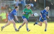 21 November 2010; Claire O'Connell, St Conleth's, Laois, in action against Brid Troy, left, and Deirdre Troy, West Clare Gaels. Tesco All-Ireland Intermediate Ladies Football Club Championship Final, West Clare Gaels, Clare v St Conleth's, Laois, McDonagh Park, Nenagh, Co. Tipperary. Picture credit: Diarmuid Greene / SPORTSFILE