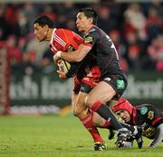 21 November 2010; Doug Howlett, Munster, is tackled by Regan King, Llanelli Scarlets. Celtic League, Munster v Llanelli Scarlets, Musgrave Park, Cork. Picture credit: Brendan Moran / SPORTSFILE