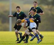 22 November 2010; Callum Fitzsimons, CBS Naas, is tackled by Robbie Bradshaw, East Glendalough. Duff Cup Semi-Final, CBS Naas v East Glendalough, Old Wesley RFC, Kiltiernan, Co. Dublin. Picture credit: Barry Cregg / SPORTSFILE