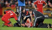 21 November 2010; Peter Borlase, Munster, is attended to my medical staff after going down with a shoulder injury. Celtic League, Munster v Llanelli Scarlets, Musgrave Park, Cork. Picture credit: Brendan Moran / SPORTSFILE