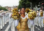 1 September 2016; Ahead of the American Football Showcase, where six top high school teams will play a triple-header of games as part of the Aer Lingus College Football Classic, all schools’ players, coaches, bands and cheerleaders took part in a parade through the streets of Dublin culminating in Trinity College Dublin for a Pep Rally. The three games take place on Friday 2nd September in Donnybrook Stadium where children under 16 go free and adults may make a voluntary donation of €10, with all proceeds being donated to Special Olympics Ireland. Check out www.collegefootballireland.com for more information. Pictured is a Boston College Cheerleader during the welcome parade in Dublin. Photo by Sam Barnes/Sportsfile