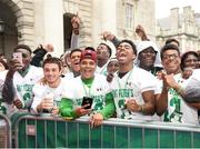 1 September 2016; Ahead of the American Football Showcase, where six top high school teams will play a triple-header of games as part of the Aer Lingus College Football Classic, all schools’ players, coaches, bands and cheerleaders took part in a parade through the streets of Dublin culminating in Trinity College Dublin for a Pep Rally. The three games take place on Friday 2nd September in Donnybrook Stadium where children under 16 go free and adults may make a voluntary donation of €10, with all proceeds being donated to Special Olympics Ireland. Check out www.collegefootballireland.com for more information. Pictured are players from the St Peters Prep amercian football team during the pep rally at Trinity College in Dublin. Photo by Sam Barnes/Sportsfile
