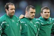 28 November 2010; Ireland players, from left, Geordan Murphy, Cian Healy, and Gordon D'arcy, stand for the national anthems. Autumn International, Ireland v Argentina, Aviva Stadium, Lansdowne Road, Dublin. Picture credit: Brian Lawless / SPORTSFILE