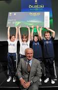 30 November 2010; Republic of Ireland manager Giovanni Trapattoni with children, left to right, Rosin Gleeson, age 8, from Dublin, Isabelle Maher, age 9, from Kilcock, Co. Kildare, Adam Drewett, age 8, from Dublin and Alex McDonagh, age 8, from Dublin, during the launch of the UEFA Europa League Final. UEFA Europa League Final Dublin 2011 launch, Convention Centre Dublin, Spencer Dock, North Wall Quay, Dublin. Picture credit: David Maher / SPORTSFILE