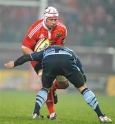 4 December 2010; Denis Leamy, Munster, is tackled by Richard Mustoe, Cardiff Blues. Celtic League, Munster v Cardiff Blues, Thomond Park, Limerick. Picture credit: Brendan Moran / SPORTSFILE