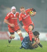 4 December 2010; Keith Earls, Munster, is tackled by Sam Warburton, Cardiff Blues. Celtic League, Munster v Cardiff Blues, Thomond Park, Limerick. Picture credit: Brendan Moran / SPORTSFILE