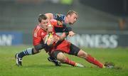 4 December 2010; Denis Hurley, Munster, is tackled by Richie Rees, Cardiff Blues. Celtic League, Munster v Cardiff Blues, Thomond Park, Limerick. Picture credit: Brendan Moran / SPORTSFILE