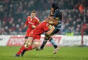 4 December 2010; Ma'ama Molitika, Cardiff Blues, fails to stop the progress of Paul O'Connell, Munster. Celtic League, Munster v Cardiff Blues, Thomond Park, Limerick. Picture credit: Brendan Moran / SPORTSFILE