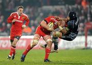 4 December 2010; Ma'ama Molitika, Cardiff Blues, fails to stop the progress of Paul O'Connell, Munster. Celtic League, Munster v Cardiff Blues, Thomond Park, Limerick. Picture credit: Brendan Moran / SPORTSFILE