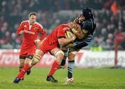 4 December 2010; Ma'ama Molitika, Cardiff Blues, fails to stop the progress of Paul O'Connell, Munster. Celtic League, Munster v Cardiff Blues, Thomond Park, Limerick. Picture credit: Brendan Moran / SPORTSFILE