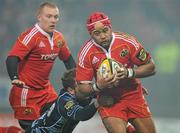 4 December 2010; Sam Tuitupou, Munster, is tackled by Dan Parks, Cardiff Blues. Celtic League, Munster v Cardiff Blues, Thomond Park, Limerick. Picture credit: Brendan Moran / SPORTSFILE