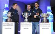 6 December 2010; Leinster's Rob Kearney pulls out the name of Terenure College during the Powerade Leinster Schools Rugby Junior Cup draw alongside team-mates Andre Conway, left, and Brian O'Driscoll during the Powerade Leinster Schools Cup Competition Draws. Aviva Stadium, Lansdowne Road. Picture credit: Stephen McCarthy / SPORTSFILE