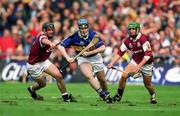 9 September 2001; Michael Ryan of Tipperary in action against Alan Kerins, left, and Fergal Healy of Galway during the Guinness All-Ireland Senior Hurling Championship Final match between Tipperary and Galway at Croke Park in Dublin. Photo by Brendan Moran/Sportsfile