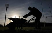 12 December 2010; Thomond Park groundsman James 'Bud' Leonard clears hay from the pitch before the game. Heineken Cup Pool 3 - Round 3, Munster v Ospreys, Thomond Park, Limerick. Picture credit: Diarmuid Greene / SPORTSFILE