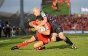 12 December 2010; Doug Howlett, Munster, goes over to score his side's first try despite the efforts of Richard Fussell, Ospreys. Heineken Cup Pool 3 - Round 3, Munster v Ospreys, Thomond Park, Limerick. Picture credit: Diarmuid Greene / SPORTSFILE