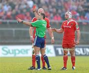12 December 2010; Munster's Paul O'Connell is shown the red card by referee Christophe Berdos as match captain Denis Leamy looks on. Heineken Cup Pool 3 - Round 3, Munster v Ospreys, Thomond Park, Limerick. Picture credit: Matt Browne / SPORTSFILE