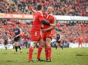 12 December 2010; Munster's Johne Murphy celebrates with team-mate Keith Earls, right, after scoring his side's third try. Heineken Cup Pool 3 - Round 3, Munster v Ospreys, Thomond Park, Limerick. Picture credit: Diarmuid Greene / SPORTSFILE