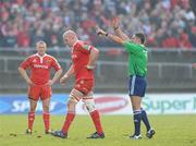 12 December 2010; Munster's Paul O'Connell is shown a red card by referee Christophe Berdos as Keith Earls looks on. Heineken Cup Pool 3 - Round 3, Munster v Ospreys, Thomond Park, Limerick. Picture credit: Matt Browne / SPORTSFILE