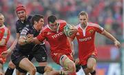 12 December 2010; James Coughlan, Munster, is tackled by James Hook, Ospreys. Heineken Cup Pool 3 - Round 3, Munster v Ospreys, Thomond Park, Limerick. Picture credit: Diarmuid Greene / SPORTSFILE