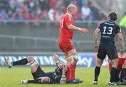 12 December 2010; Ospreys' Jonathan Thomas, left, lies on the field after an incident with Munster's Paul O'Connell, which led to Paul O'Connell being sent off by referee Christophe Berdos. Heineken Cup Pool 3 - Round 3, Munster v Ospreys, Thomond Park, Limerick. Picture credit: Matt Browne / SPORTSFILE