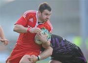 12 December 2010; Damien Varley, Munster, is tackled by Paul James, Ospreys. Heineken Cup Pool 3 - Round 3, Munster v Ospreys, Thomond Park, Limerick. Picture credit: Matt Browne / SPORTSFILE