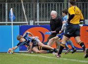 15 December 2010; Fergus Halpin, Newpark Comprehensive, goes over to score his side's first try from the challange of Kevin McGrath, Skerries C.C.. McMullen Cup Final, Skerries C.C. v Newpark Comprehensive, Donnybrook, Dublin. Picture credit: David Maher / SPORTSFILE