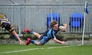 15 December 2010; Zac Jungmann, Newpark Comprehensive, goes over to score his side's second try from the challange of Mark Boylan, Skerries C.C.. McMullen Cup Final, Skerries C.C. v Newpark Comprehensive, Donnybrook, Dublin. Picture credit: David Maher / SPORTSFILE