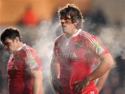 18 December 2010; Donncha O'Callaghan and David Wallace, left, Munster, during the game. Heineken Cup, Pool 3, Round 4, Ospreys v Munster, Liberty Stadium, Swansea, Wales. Picture credit: Stephen McCarthy / SPORTSFILE