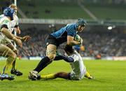 18 December 2010; Sean O'Brien, Leinster, gets past the tackle of Brock James, ASM Clermont Auvergne, on his to scoring his side's third try. Heineken Cup, Pool 2, Round 4, Leinster v ASM Clermont Auvergne, Aviva Stadium, Lansdowne Road, Dublin. Picture credit: Matt Browne / SPORTSFILE