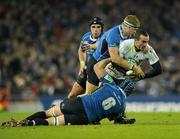 18 December 2010; Benoit Baby, ASM Clermont Auvergne, is tackled by Jamie Heaslip and Sean O'Brien, 6, Leinster. Heineken Cup, Pool 2, Round 4, Leinster v ASM Clermont Auvergne, Aviva Stadium, Lansdowne Road, Dublin. Picture credit: Matt Browne / SPORTSFILE