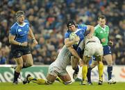 18 December 2010; Isaac Boss, Leinster, with support from team mate Jamie Heaslip, left, is tackled by Loic Jacquet and Morgan Parra, right, ASM Clermont Auvergne. Heineken Cup, Pool 2, Round 4, Leinster v ASM Clermont Auvergne, Aviva Stadium, Lansdowne Road, Dublin. Picture credit: Brendan Moran / SPORTSFILE