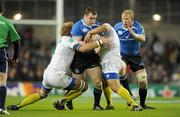 18 December 2010; Cian Healy, Leinster, supported by team-mate Leo Cullen, is tackled by Thibaut Privat, left, and Ti'i Paulo, ASM Clermont Auvergne. Heineken Cup, Pool 2, Round 4, Leinster v ASM Clermont Auvergne, Aviva Stadium, Lansdowne Road, Dublin. Picture credit: Brendan Moran / SPORTSFILE