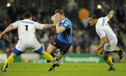 18 December 2010; Brian O'Driscoll, Leinster, in action against Thomas Domingo, left, and Ti'i Paulo, ASM Clermont Auvergne. Heineken Cup, Pool 2, Round 4, Leinster v ASM Clermont Auvergne, Aviva Stadium, Lansdowne Road, Dublin. Picture credit: Brendan Moran / SPORTSFILE