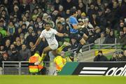 18 December 2010; Isa Nacewa, Leinster, steals a crossfield kick from Napolioni Nalaga, ASM Clermont Auvergne, during the first half. Heineken Cup, Pool 2, Round 4, Leinster v ASM Clermont Auvergne, Aviva Stadium, Lansdowne Road, Dublin. Picture credit: Brendan Moran / SPORTSFILE